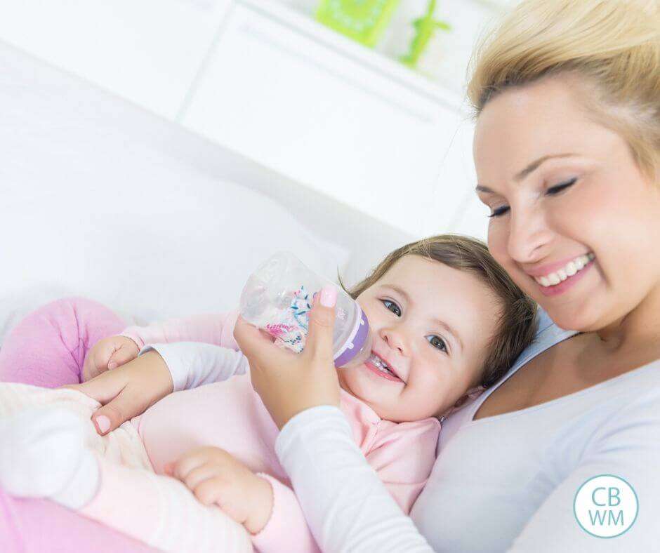 Mom feeding her baby on a schedule