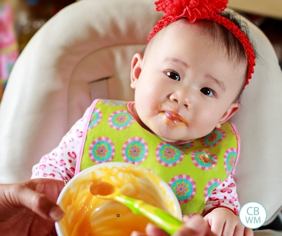 baby being fed food