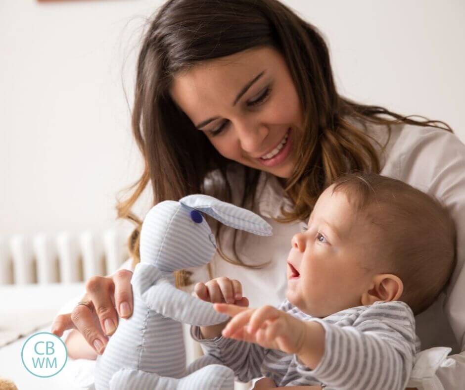 Mom and baby playing with a toy