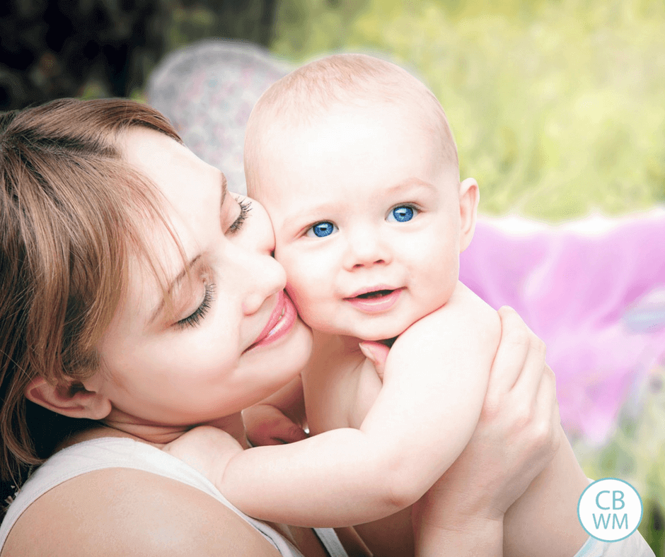 Mom hugging baby