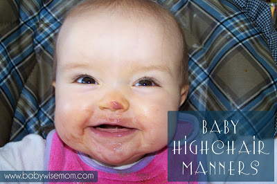 Baby eating in high chair