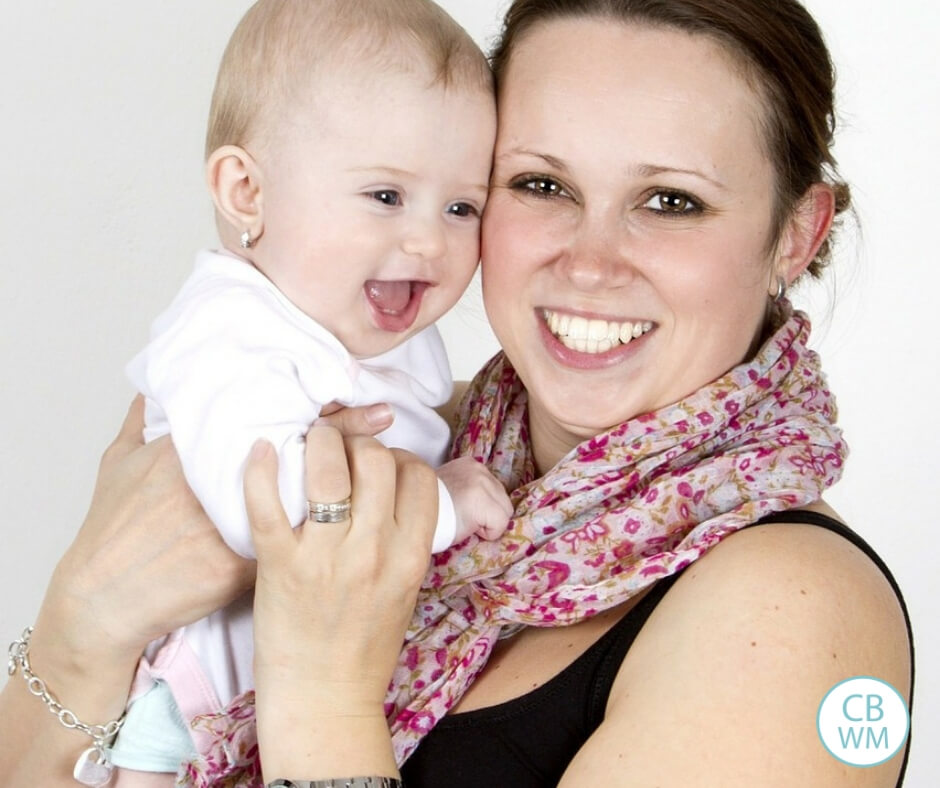 mom and baby smiling for the camera