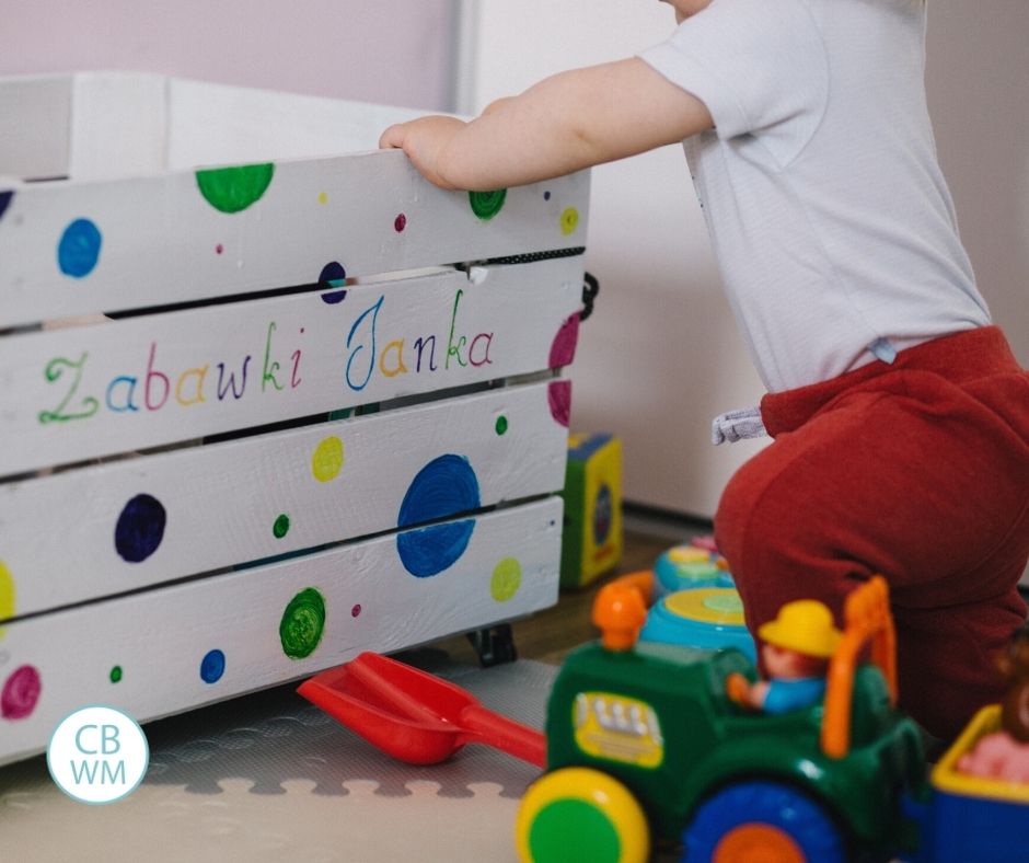 baby playing with toys independently