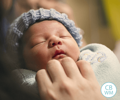 Newborn baby sleeping with hat