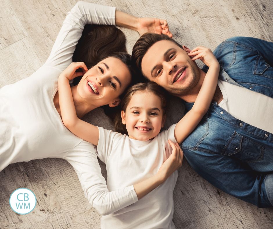 A set pf parents with their child