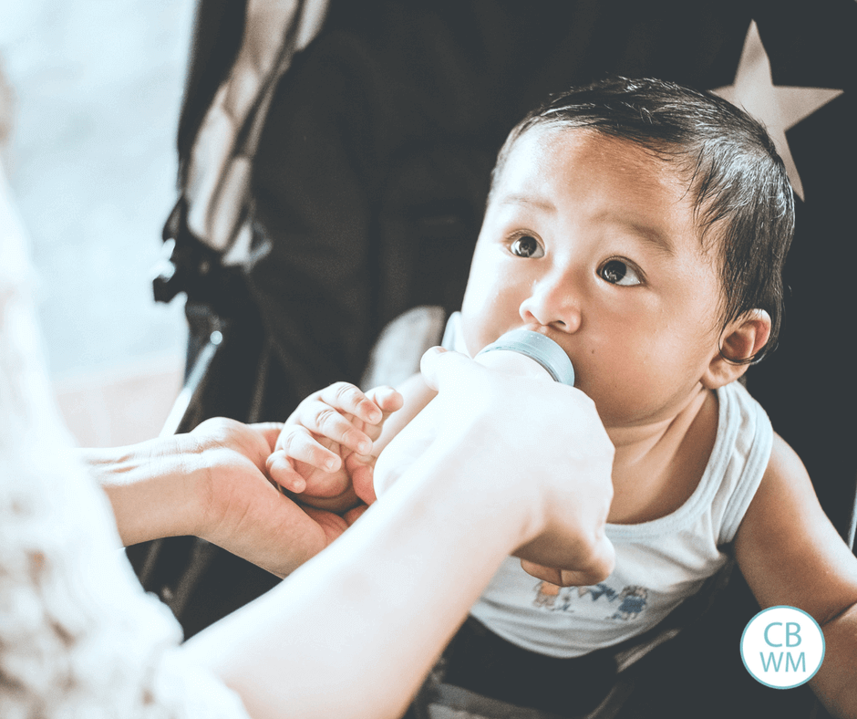 baby drinking from a bottle