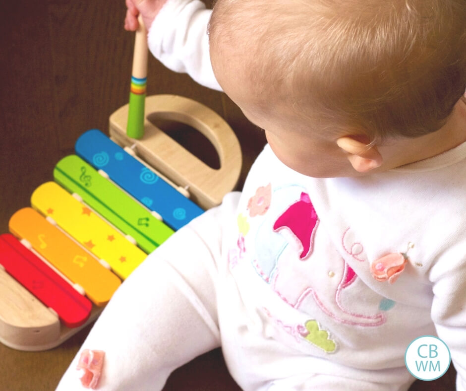 Baby toy. Baby playing with a toy.