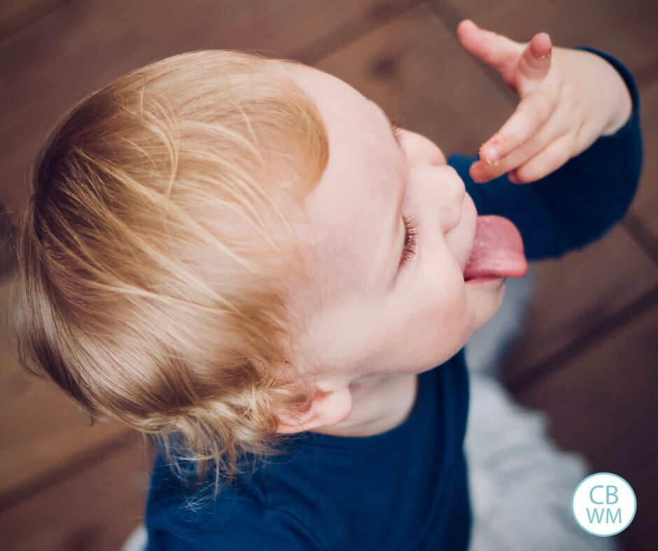 Toddler on a brown floor