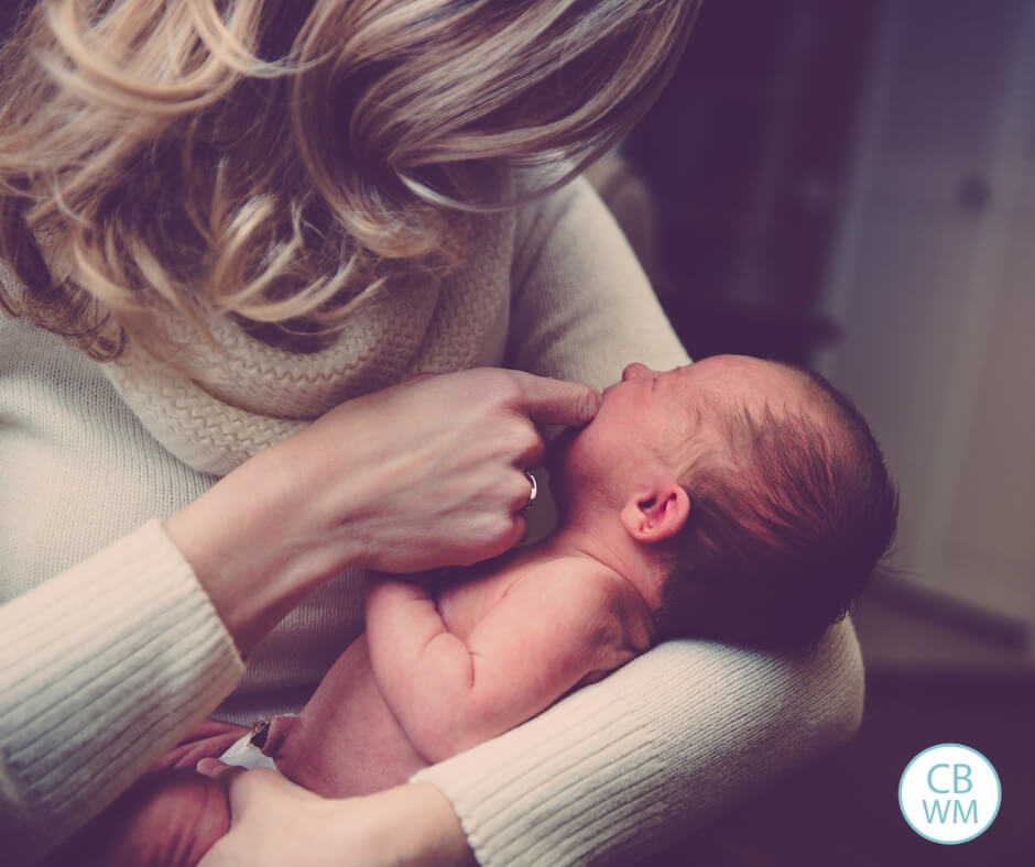 Mother holding a crying baby