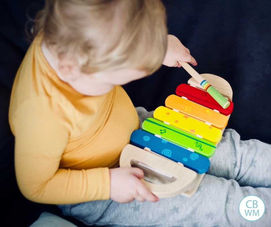 baby playing with a toy