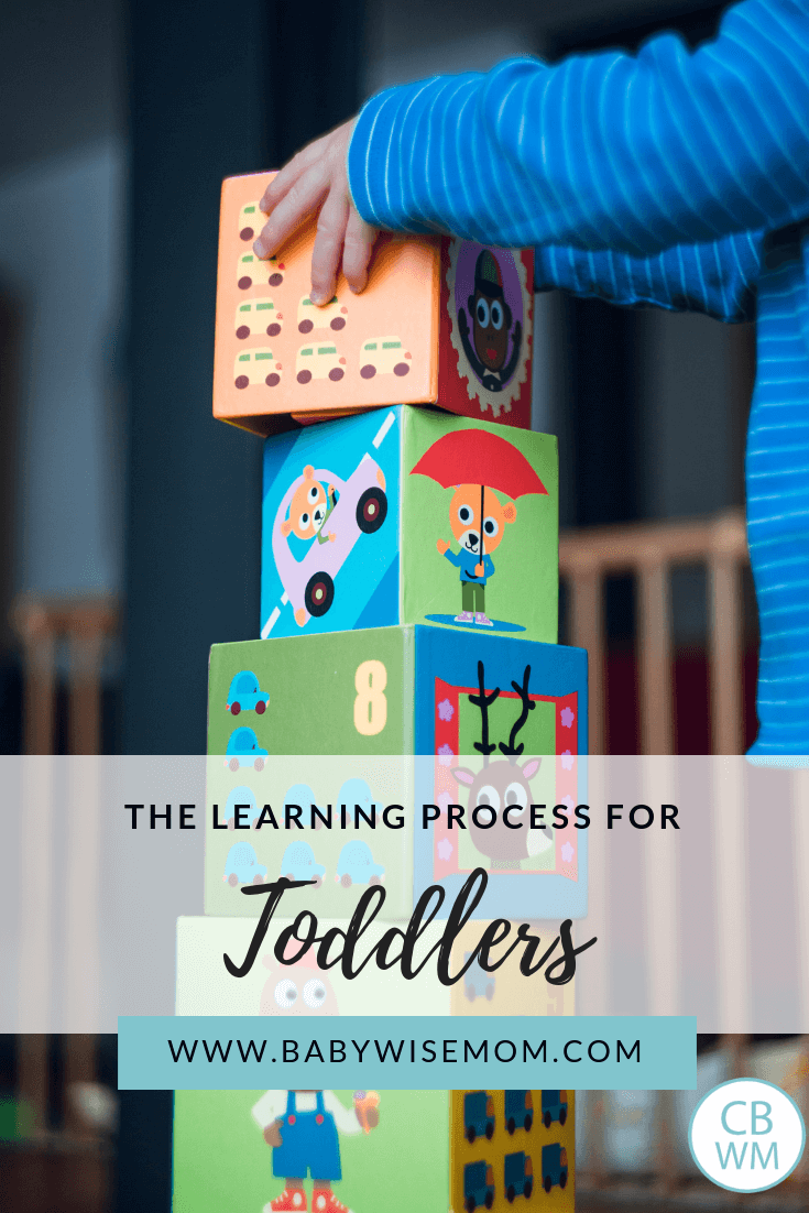 Toddler playing with blocks