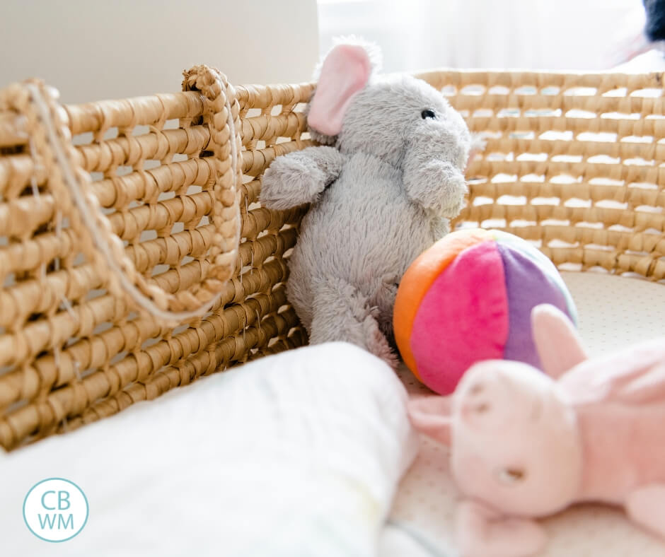 Toys in a baby bed