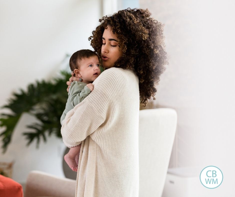 Mom soothing fussy baby