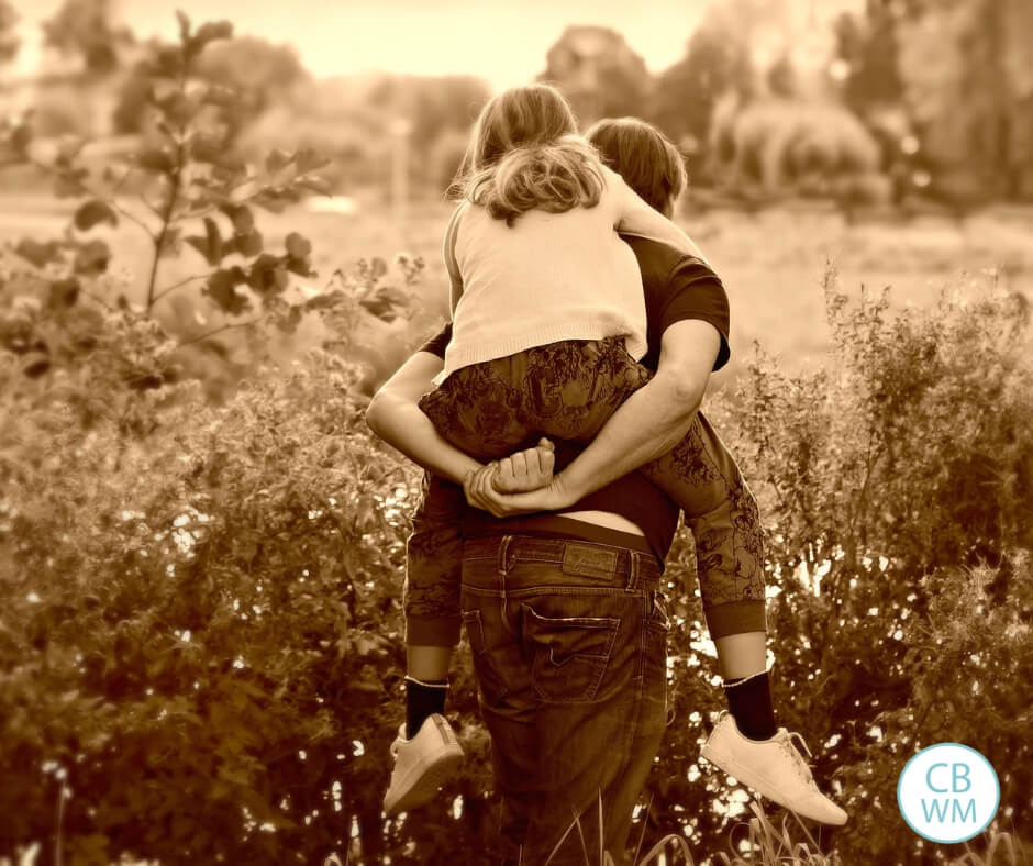 Picture of a girl getting a piggy back ride taken in sepia tone