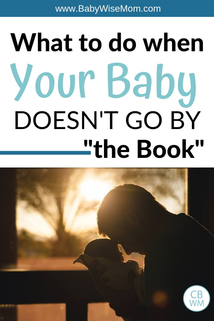 What to do when your baby doesn't go by the book with a picture of a father holding a baby.