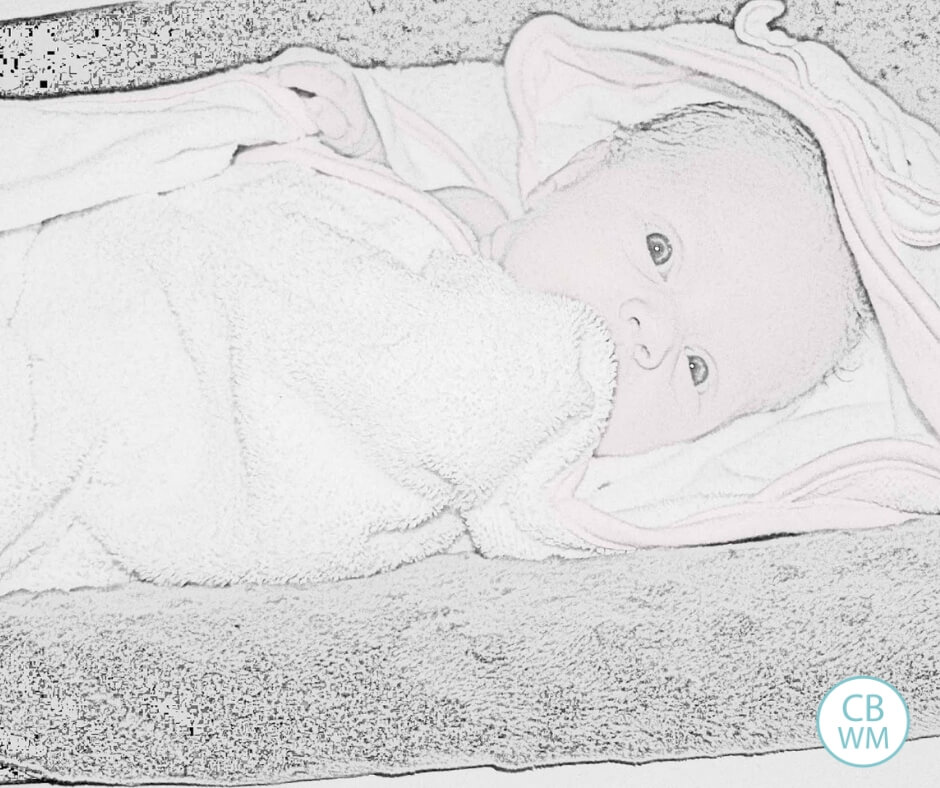 6 week old baby wrapped up in a towel