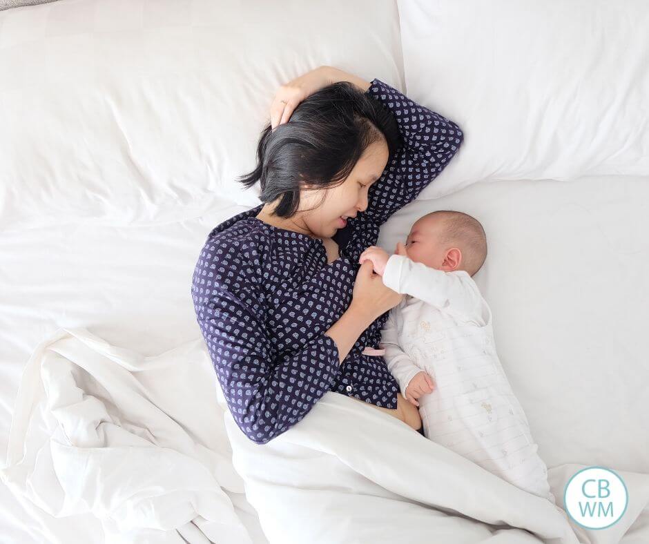 Mother and baby in bed