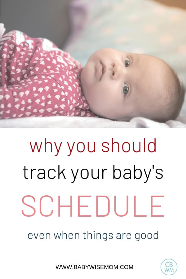 Why you should track your baby's schedule and picture of baby in pink outift