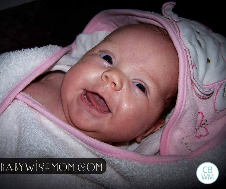 13 week old baby freshly out of the bath and wrapped up in a towel