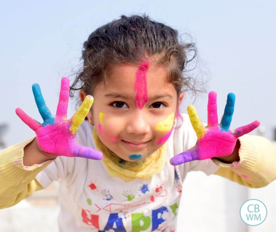 preschooler with messy hands enjoying play