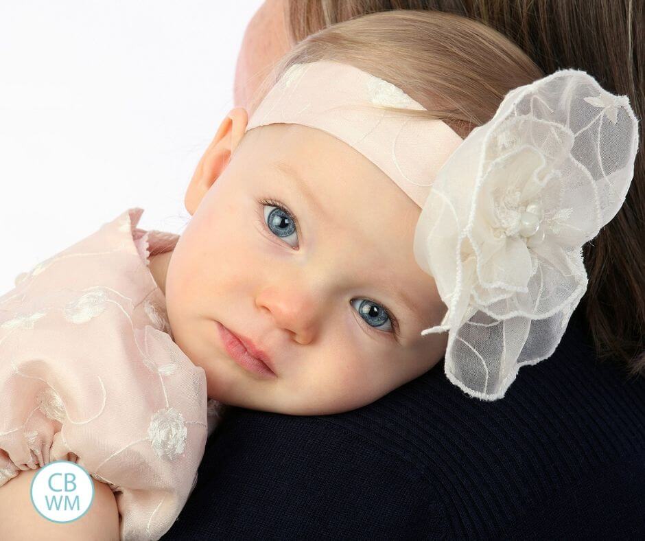 Baby laying head on shoulder