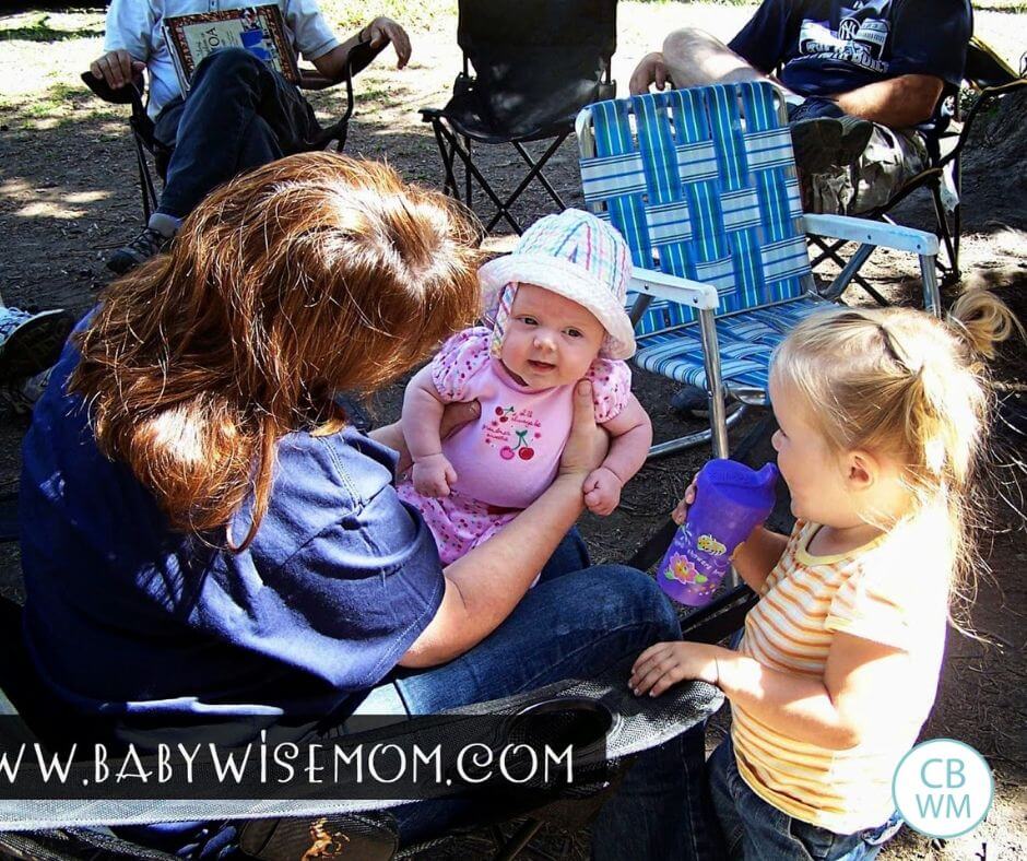 4 month old baby and her two year old sister