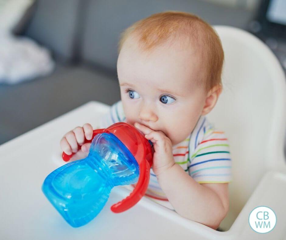 Baby drinking from sippy cup