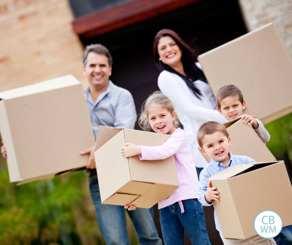 Family with moving boxes