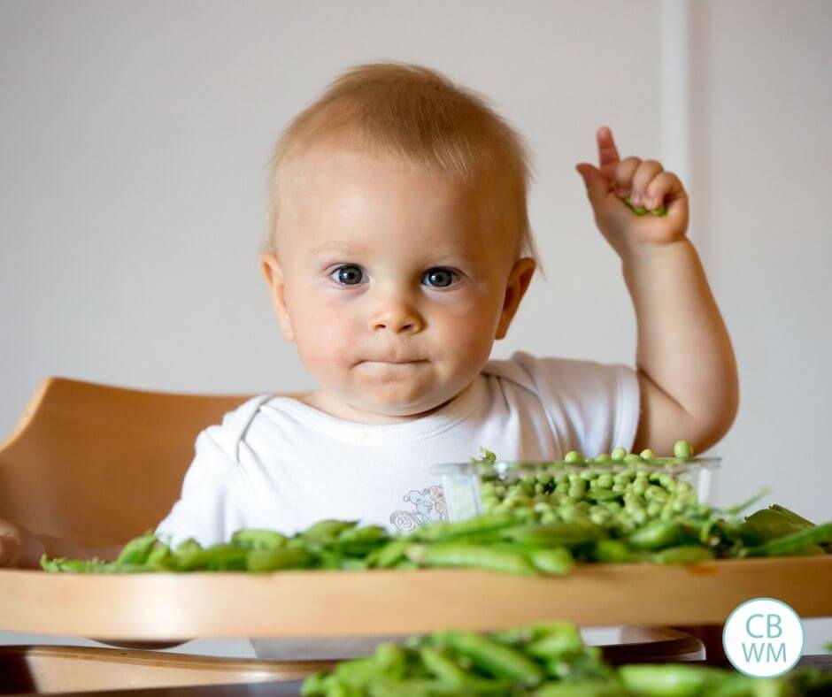 Baby eating at high chair