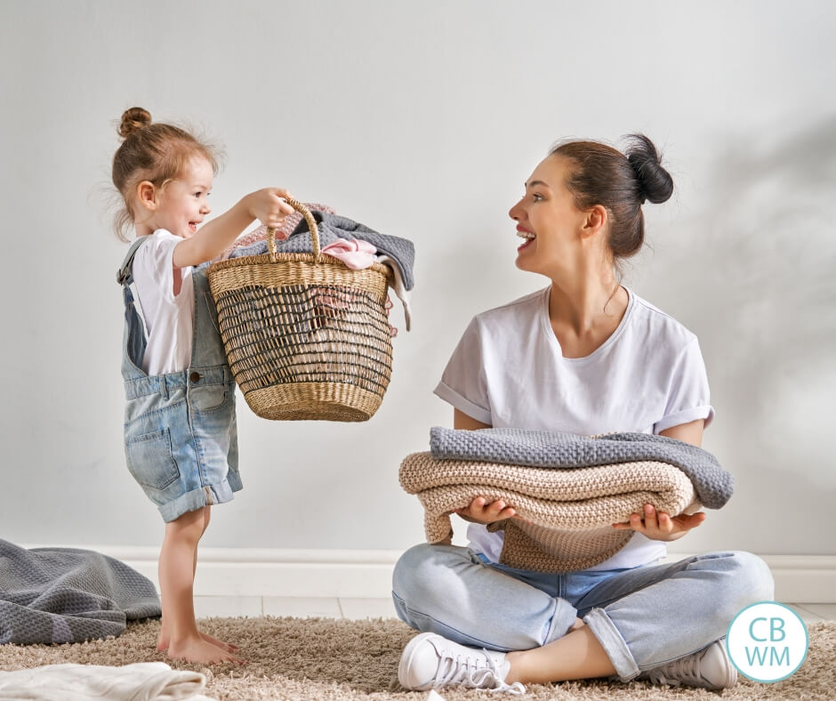 mother and daughter doing chores