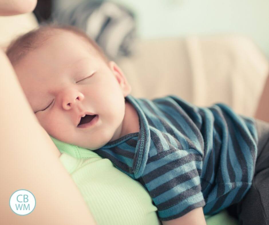 Baby sleeping on mom's chest