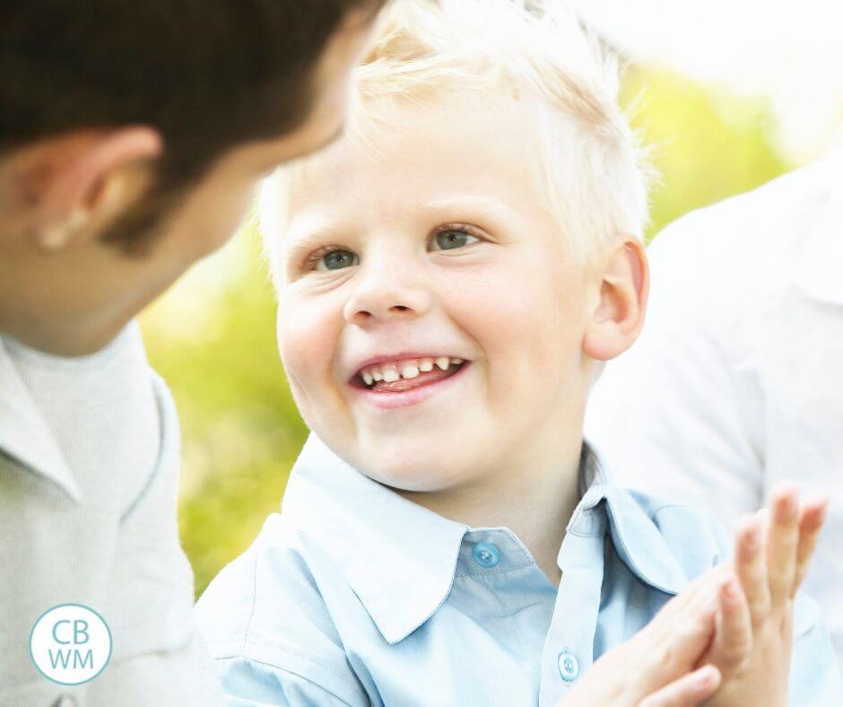 Happy child looking at his dad