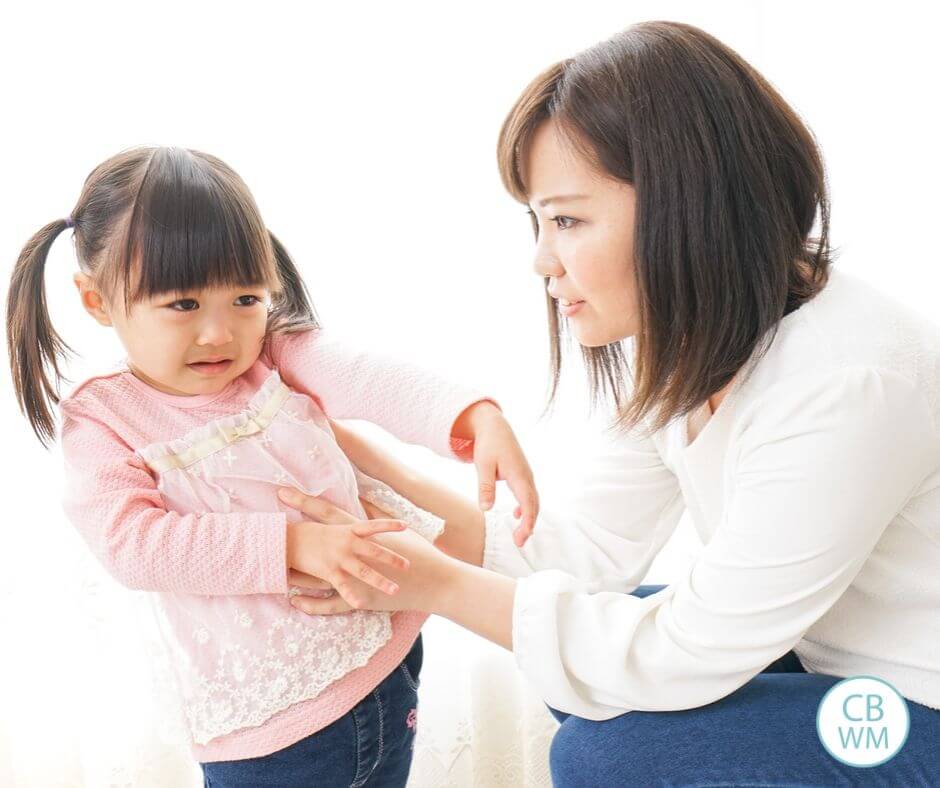 Mother with a little girl who is in trouble