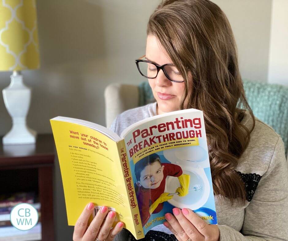 Mom reading The Parenting Breakthrough by Merrilee Boyack