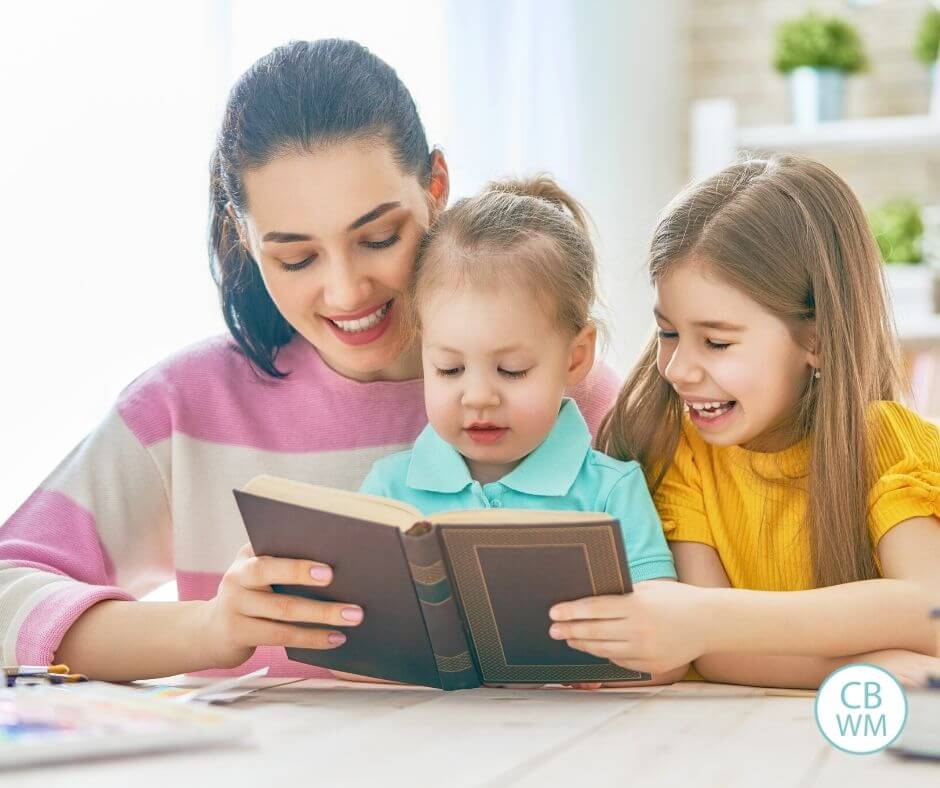 Mom reading with two children