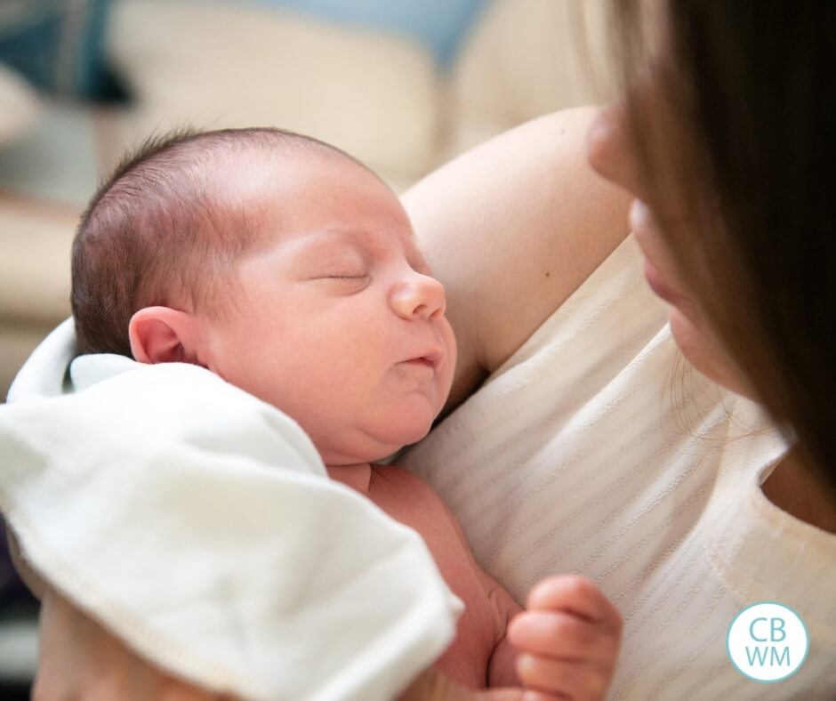 Mother holding new baby