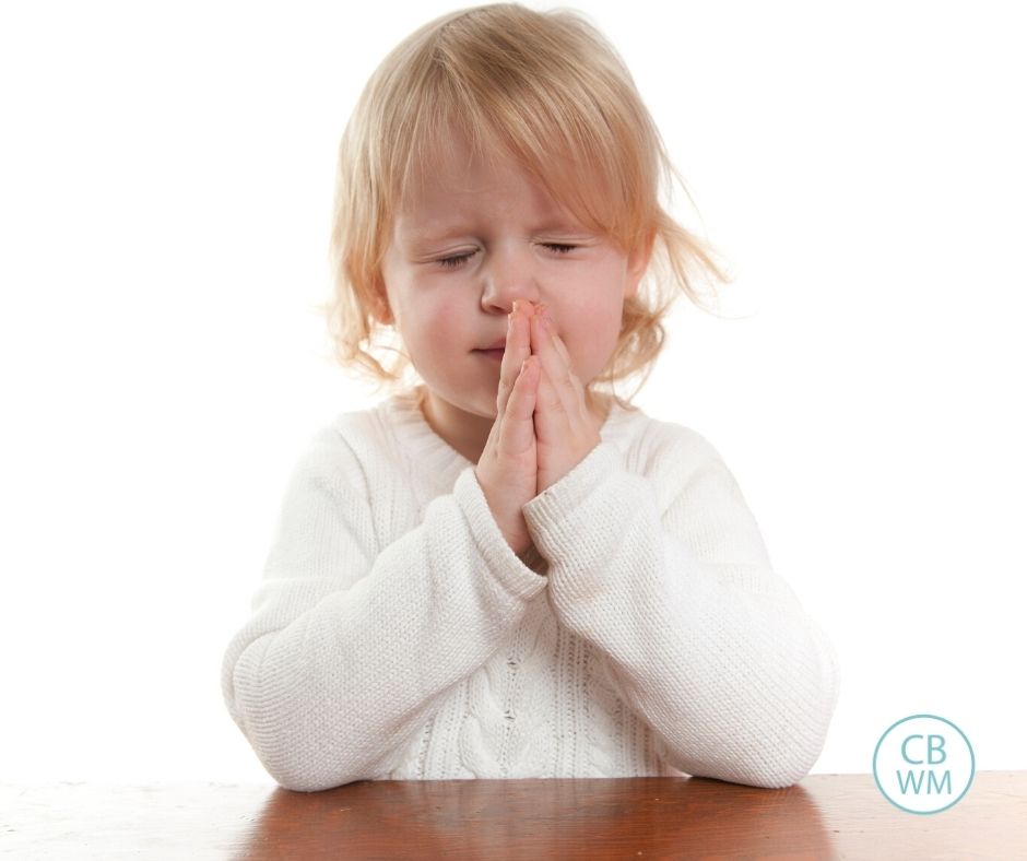 Toddler praying