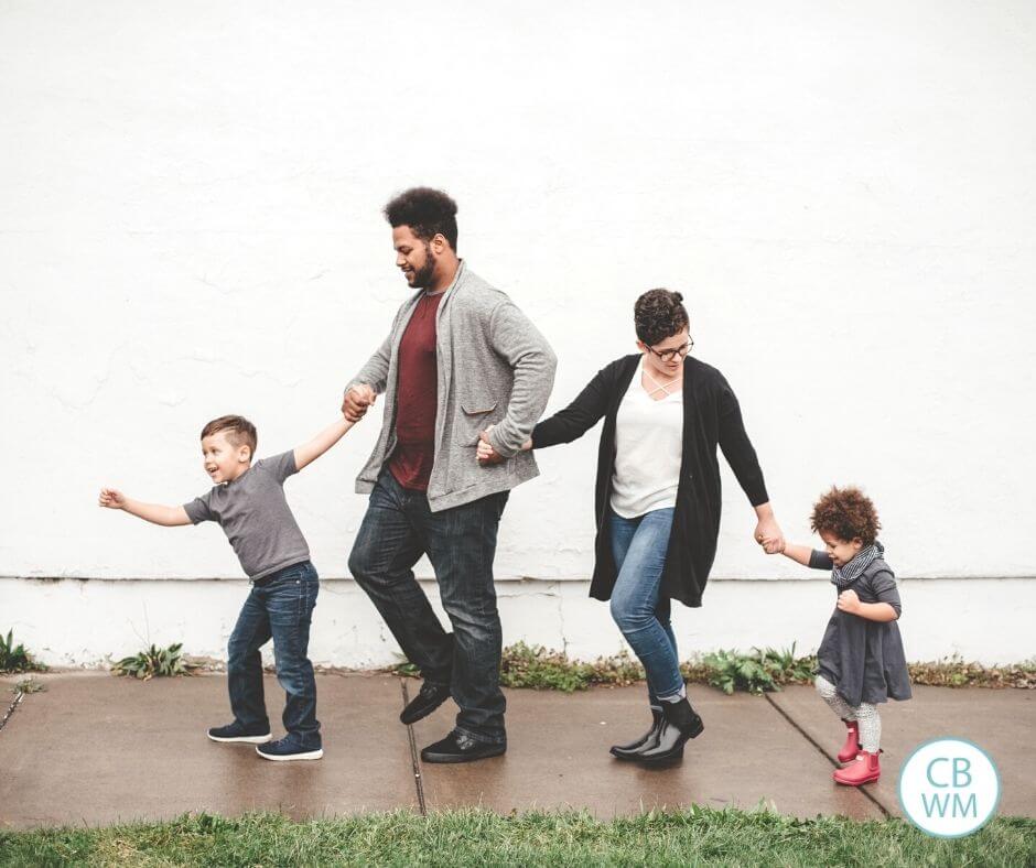 Family walking along having fun