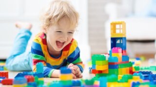 Child happily playing alone