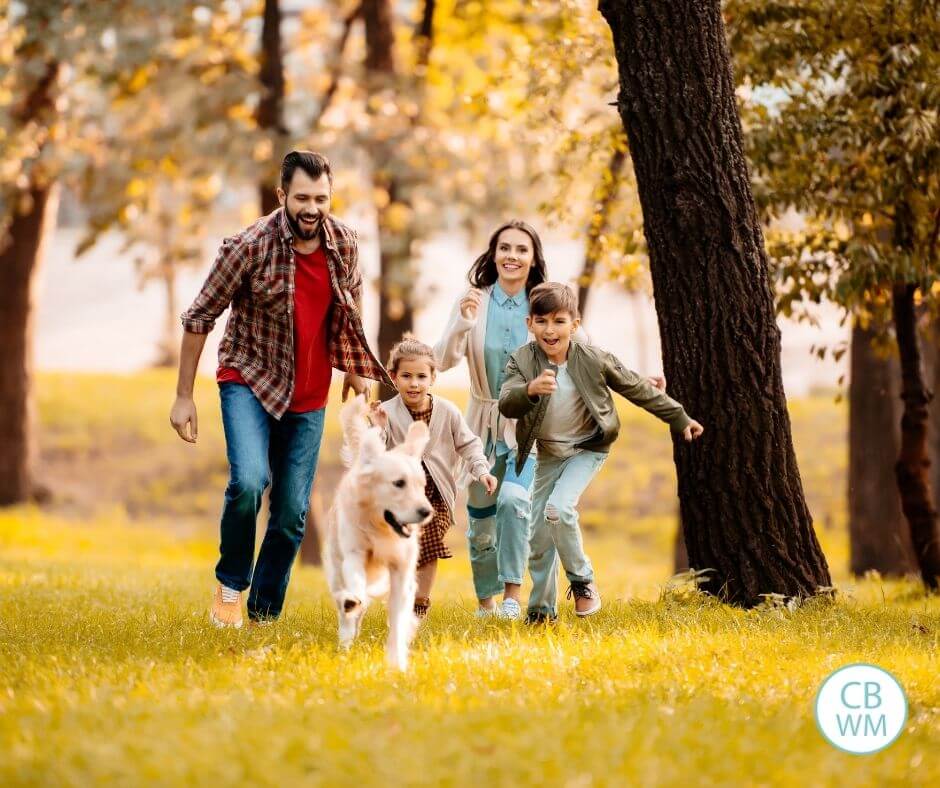 Family running through the park