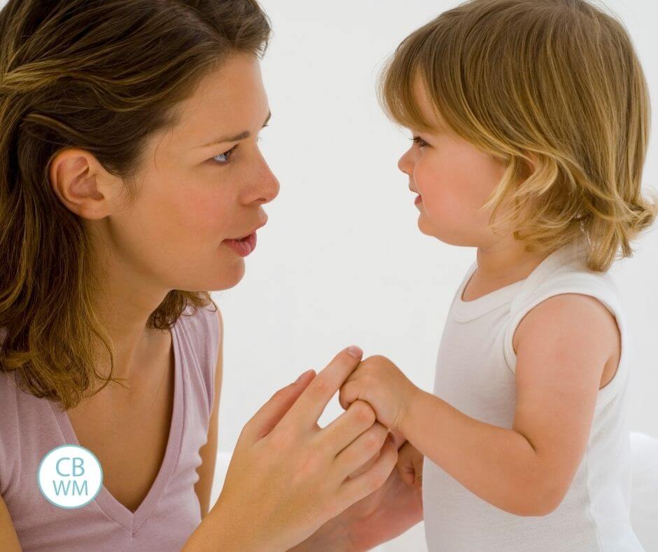 Mom correcting a toddler