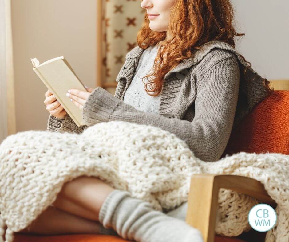 Mom reading a parenting book