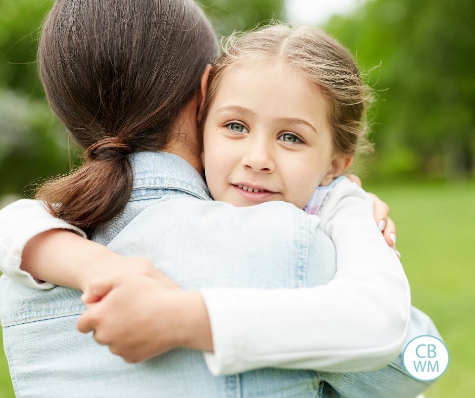 Mom and daughter hugging