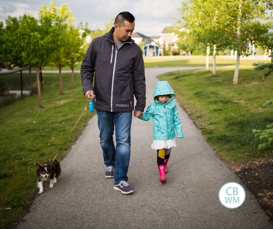 father and daughter walking