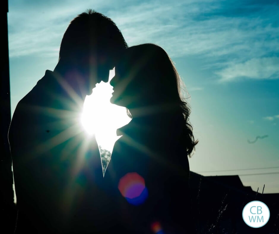 couple silhouetted in the sunset