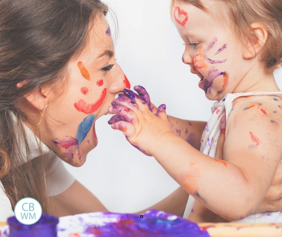 Happy mom with messy baby