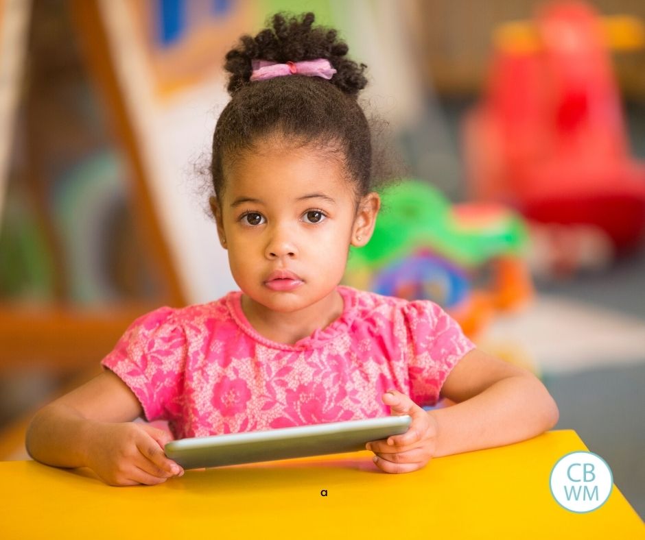 Child holding a tablet