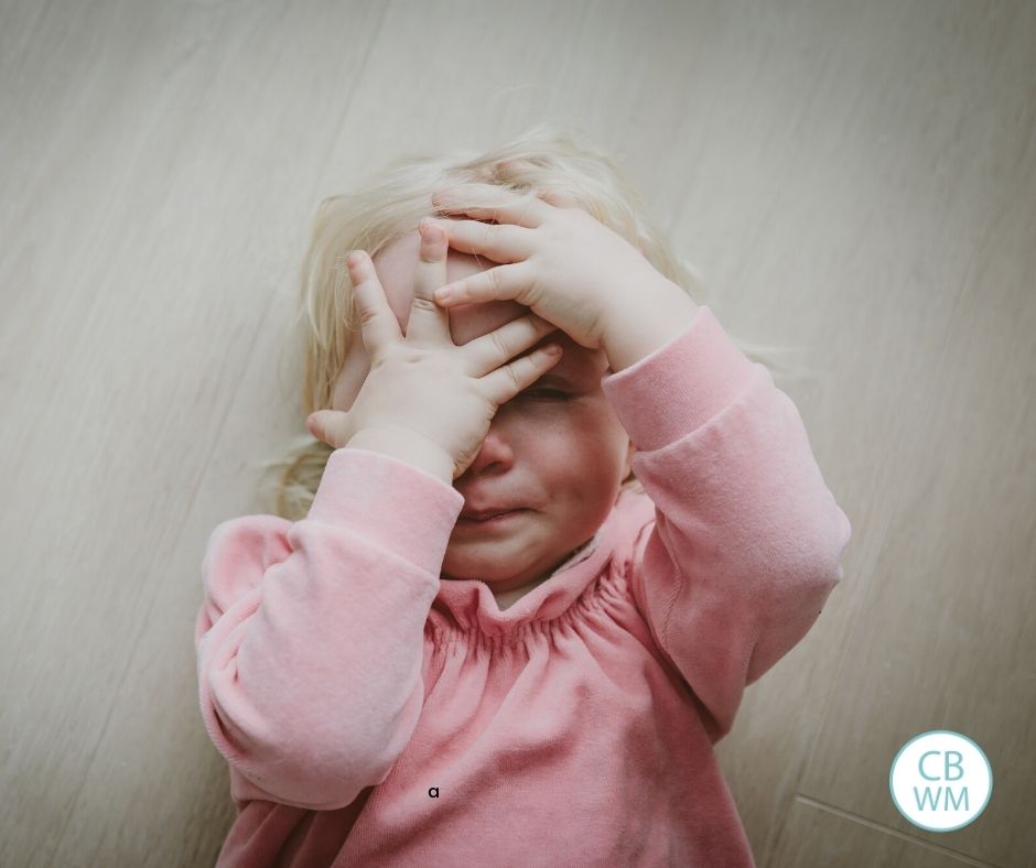 Child crying on the floor