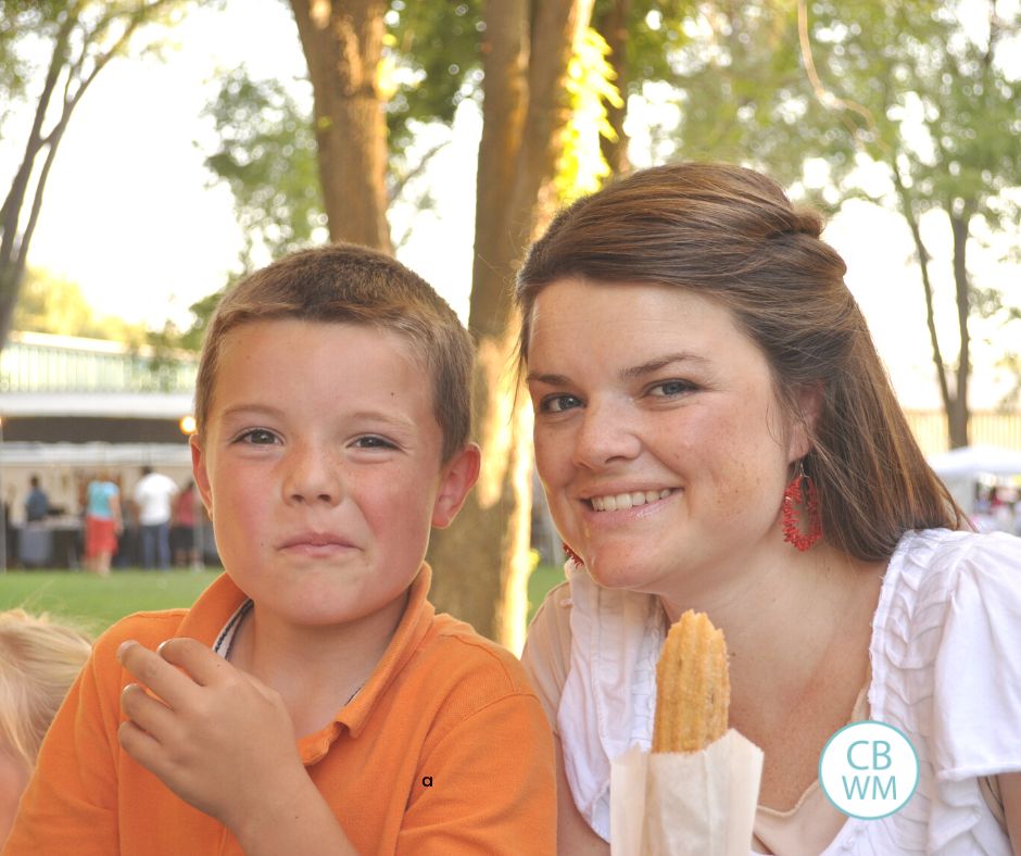 mom with churro and son