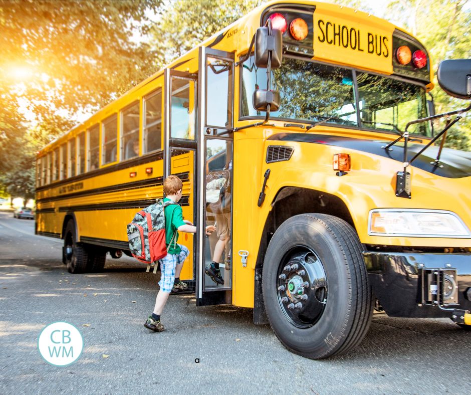 Children getting on a school bus